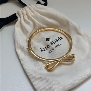 Gold bow bangle